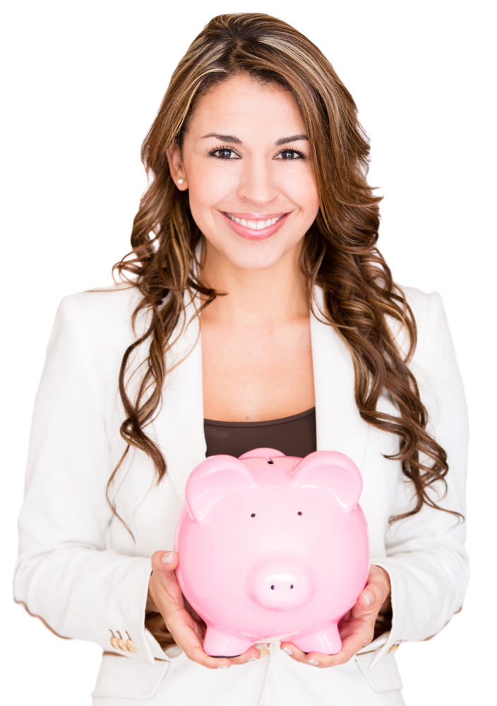 Businesswoman saving money in a piggybank - isolated over white